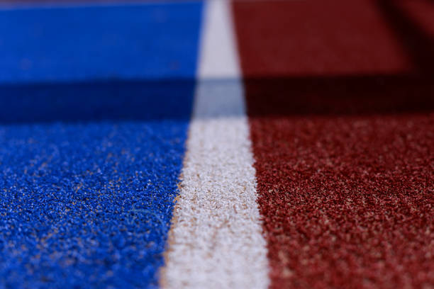 Lane markings on red running track