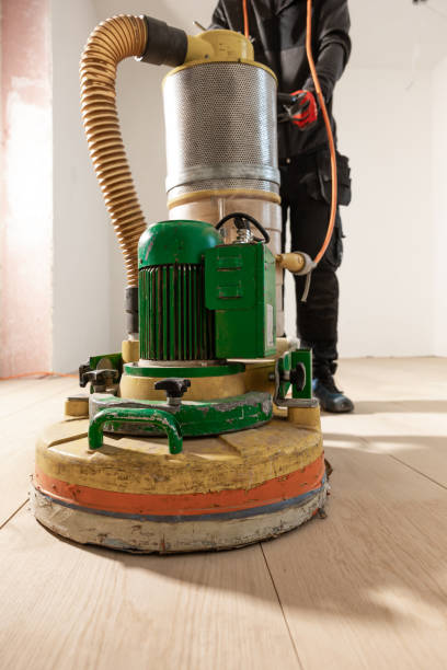 istock Worker Operating Floor Polishing Machine in Indoor Renovation Area 2197118495