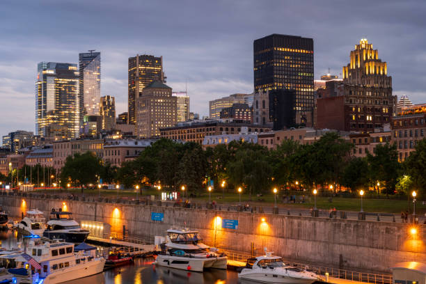 Montreal, Canada - July 4, 2024. Skyline of Old Town at night, Montreal, Quebec, Canada