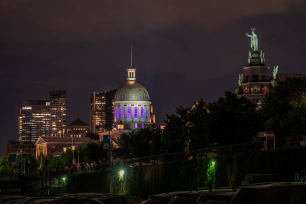 Montreal, Canada - July 4, 2024. Skyline of Old Town at night, Montreal, Quebec, Canada