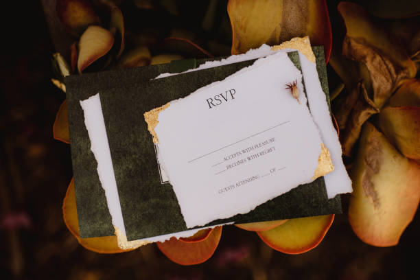 istock RSVP on wedding invitation with gold leaf and floral background 2197120177