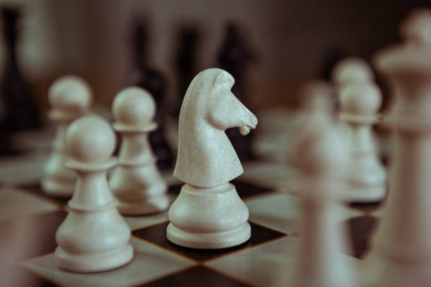 Chess board game, business ideas and competition concept. Chess figures on a chessboard.