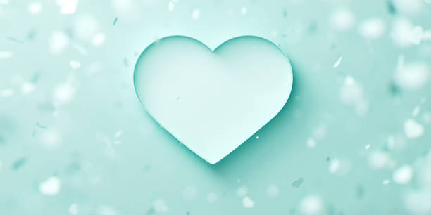 istock Turquoise opened heart-shaped box on a background with blurred falling hearts. Valentine's day romantic concept. 3d render illustration 2197128136