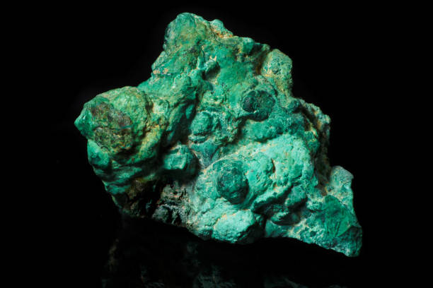 istock Malachite is a copper carbonate hydroxide mineral. Malachite has use for mineral pigment, ornamental stone, gemstone. 2197128486