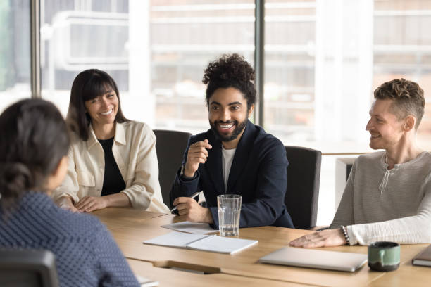 istock Happy cheerful Indian startup leader brainstorming on project 2197128921
