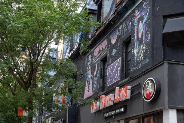 Montreal, Canada - July 5, 2024. Facade of restaurant on St Catherine in downtown Montreal, Quebec, Canada