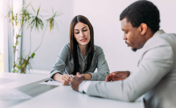 istock Business people signing a contract in the office. 2197157619