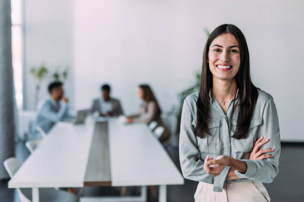 istock Confident businesswoman and her team. 2197157621