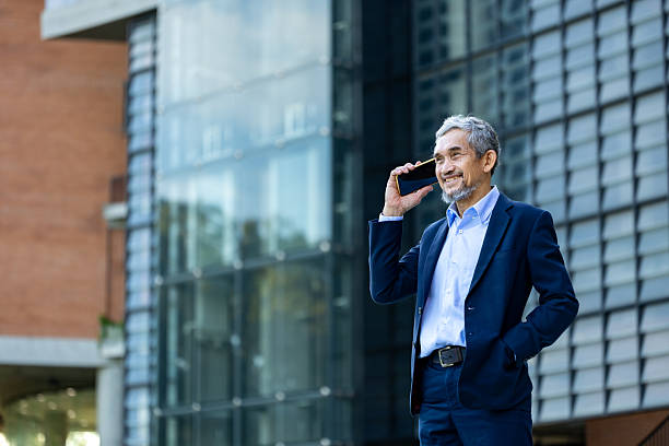 istock Senior executive managing director is answering call from shareholders for global business expansion and professional marketing strategy in stock market investment concept 2197159534