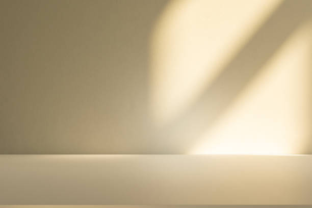istock Studio style background wall decoration presentation uses white and beige tones. with shadows cast from a nearby window, concept creating a decorative 2197160303