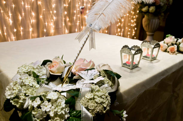 istock table setting with a quill as a pen for signing of documents 2197162330