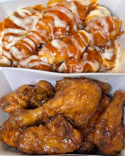 Crispy Korean fried chicken, perfectly glazed with a sweet and spicy sauce. Ideal for food photography and menus, showcasing the irresistible crunch and flavor of this beloved dish.