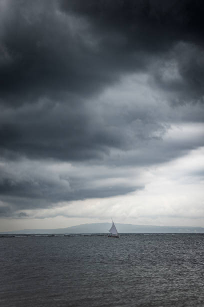 istock Fishing boat on the sea with cloudy sky. 2197170695