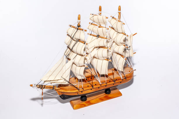istock Wooden Model Ship With Detailed Sails and Authentic Maritime Design on White Background 2197174316