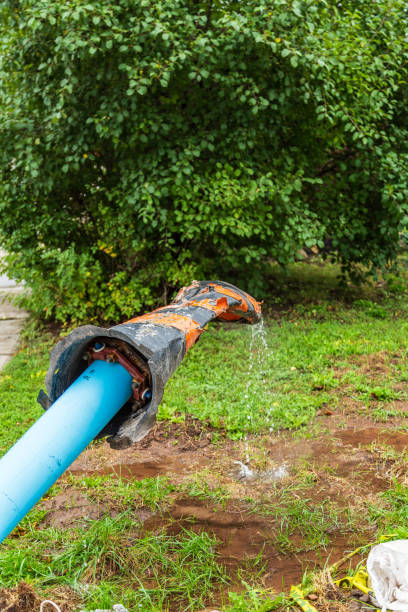 istock Damaged Water Pipe Leaking Outdoors in a Green Natural Environment 2197174412