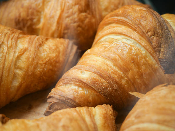 istock fresh baked croissant in a bakery 2197180609