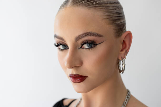 istock Young woman with heavy makeup on 2197193488