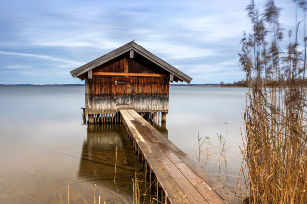 Fishing hut in nature reserve Lachsgang at Lake Chiemsee, Bavaria, Germany