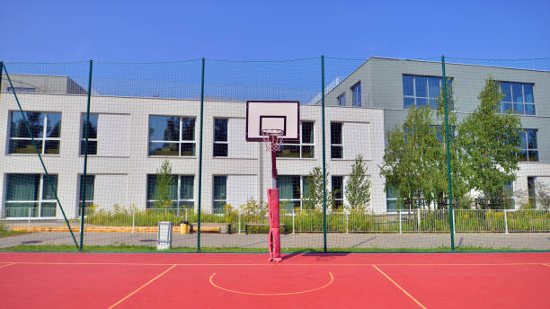 istock Schoolyard with basketball 2197197024