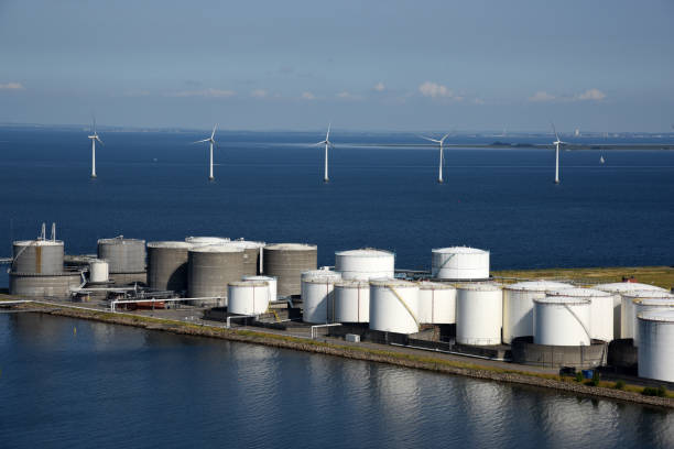 istock Oil Tanks and Wind turbines 2197199012