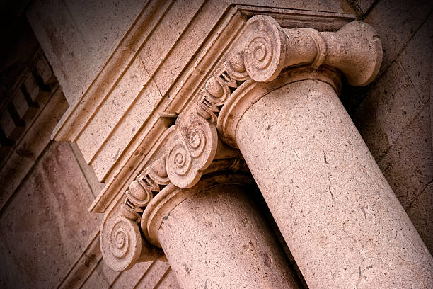 istock Close up architectural column detail from stone building exterior 2197199948