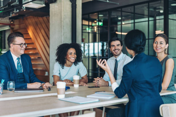 istock Group of entrepreneurs during a meeting in a modern office 2197200078