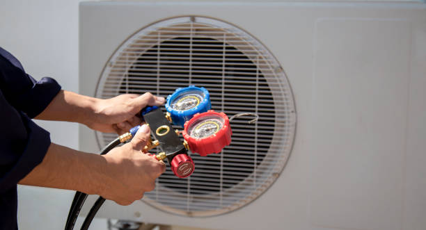 istock Technician checking the operation of the air conditioner. 2197201676