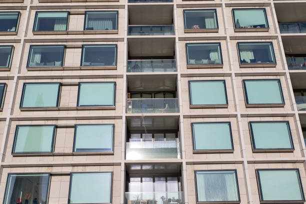istock Multi-Story Apartment Building Facade with Balconies and Windows  in London, UK. 2197202540