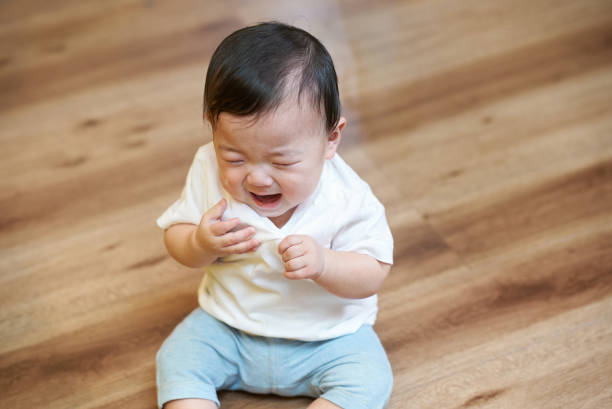 istock Crying baby in the living room 2197203726