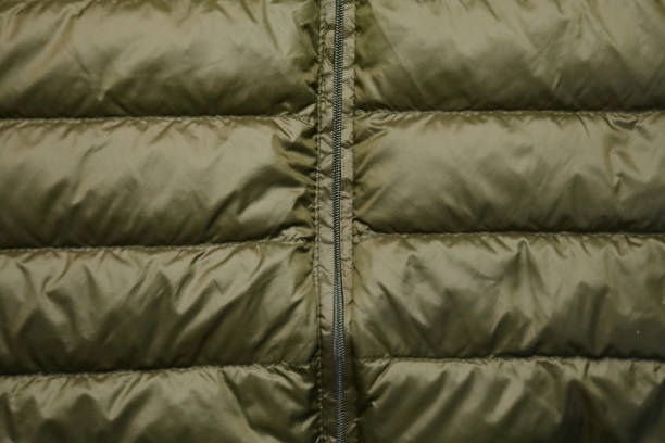 istock Light, warm, and comfortable to wear, this simple down jacket is perfect for you. 2197205389