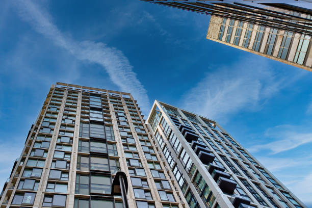 istock Three Modern High-Rise Buildings Under a Blue Sky  in London, UK. 2197206092