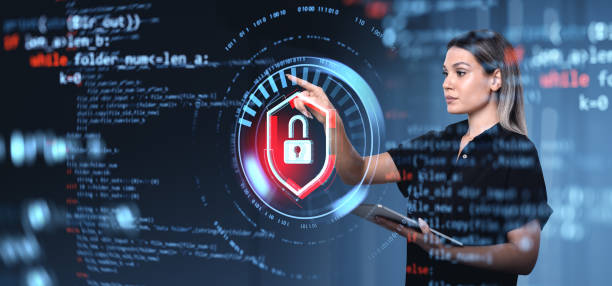 istock Woman interacting with digital lock symbol on futuristic interfa 2197206504