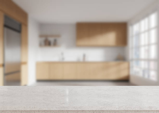 istock Modern kitchen interior with blurred background and marble countertop for product display. 3D Rendering 2197207749