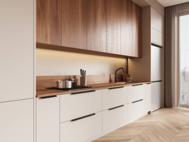 istock Modern kitchen interior with wooden and white cabinets, natural lighting through curtains, minimalistic design and clean aesthetic. 3D Rendering 2197207849