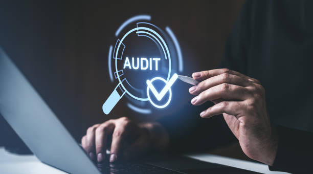 istock Digital Audit Concept with Magnifying Glass and Checkmark. 2197207916