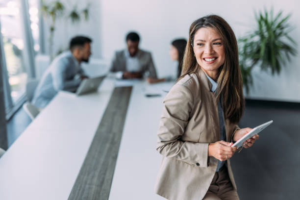 istock Successful businesswoman in the office. 2197211196