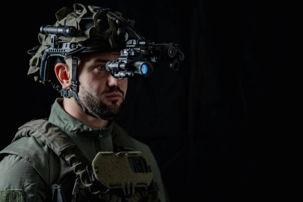 istock Secret mission: a soldier with Night vision device on his helmet infiltrates enemy territory. 2197212529