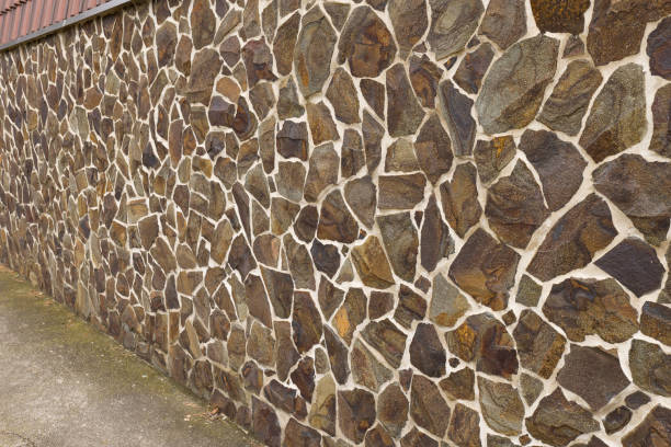 istock Hand Carved Flagstone Concrete Overlay Wall 2197213038