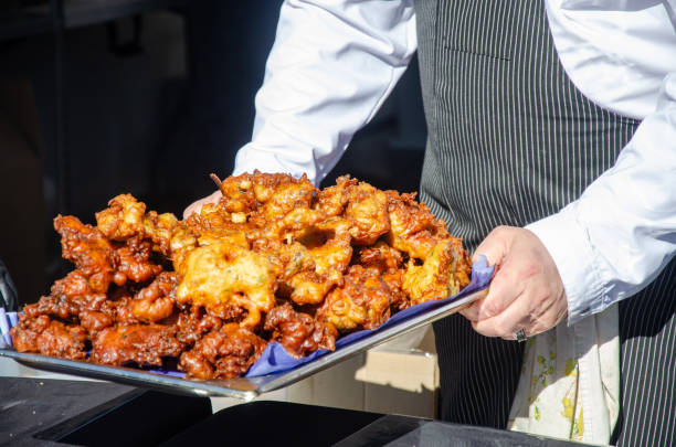 Preparing and serving food in a street kitchen