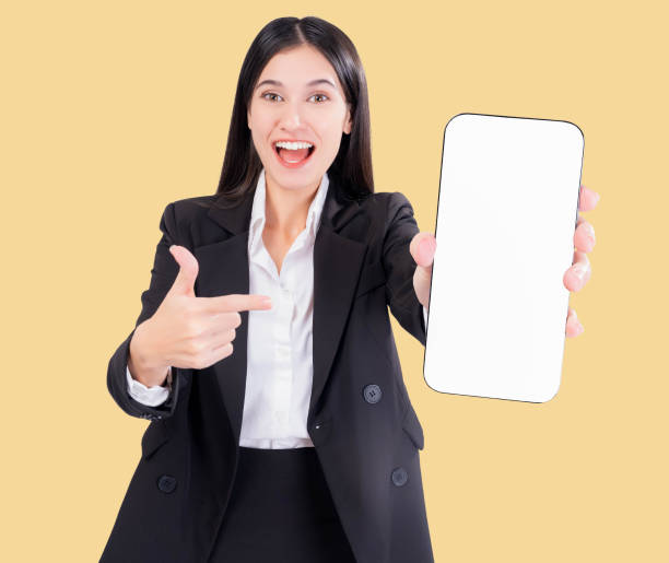 istock Businesswoman Presenting a Smartphone with Blank Screen 2197223235
