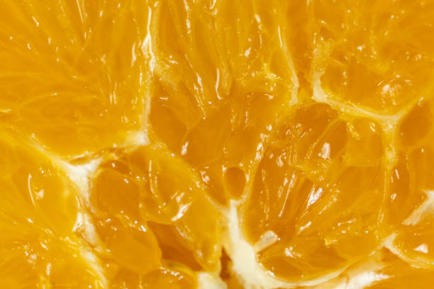 istock Macro Texture Of Ripe Fresh Orange Fruit Pulp. 2197224665