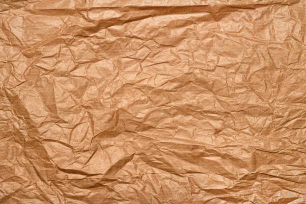istock A seamless crumpled brown paper texture ideal for background use, perfect for creative multimedia projects, vintage aesthetics, or craft-themed stock photo 2197227082