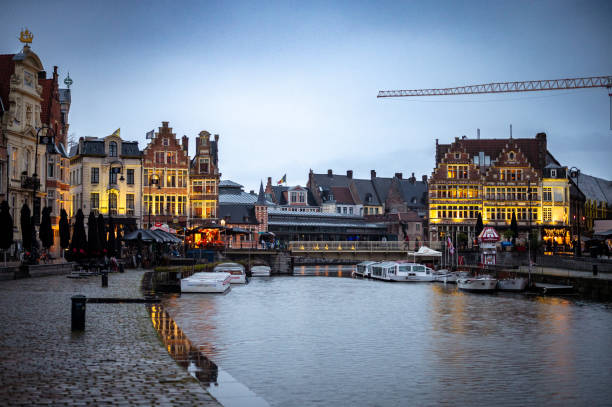 26 january 2025, Ghent, Belgium - Winter dusk in city of Ghent, old town with channels