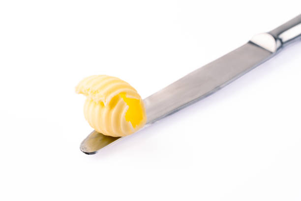istock Butter that adds flavor to meals and is for breakfast on white background 2197231992