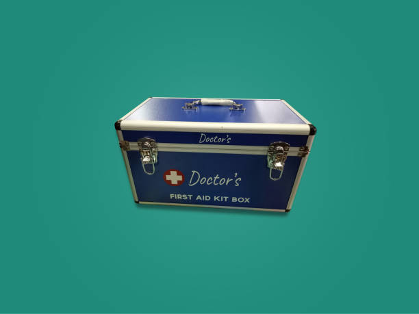 istock Top view at domestic first aid kit box. Storage necessary drug, pill, syringe, bandage. 2197236025