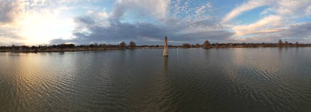 istock Sunset wide angle Woodlawn Lake light house 2197238450