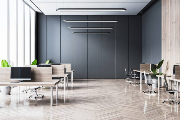 Modern office interior with desks and chairs in a spacious room. 3D Rendering