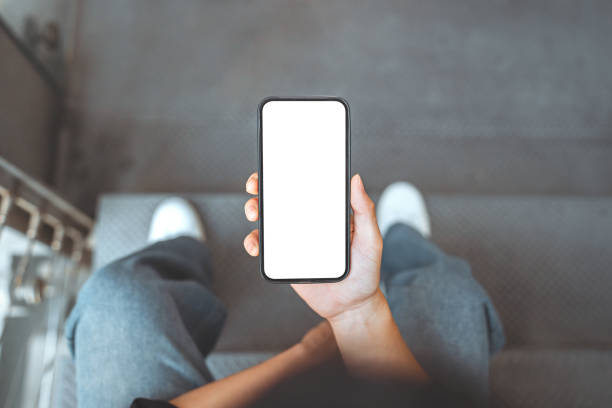 Close up - Hands of man using mobile phone blank white screen mockup, Background empty space for advertise, technology