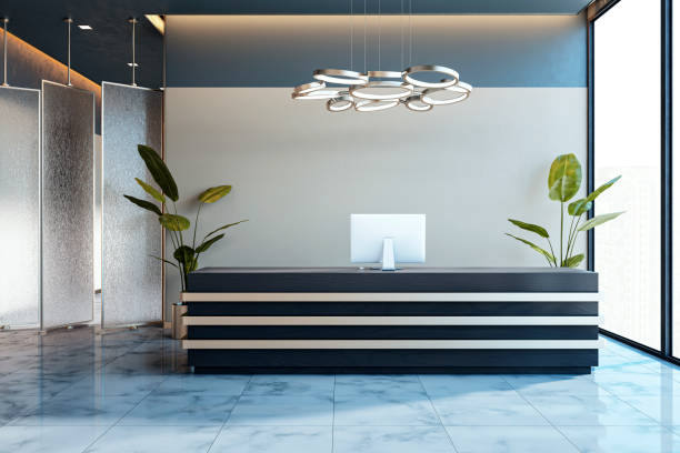 istock Modern reception desk with computer and plants in a corporate office interior. 3D Rendering 2197240400