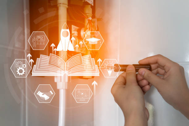 istock The concept of learning and education, increasing knowledge in the profession, studying manuals before working, electrician holding electrical appliance repair tools and hologram icons about learning. 2197240553
